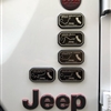 White Jeep Gladiator with Jeep Badges of Honor